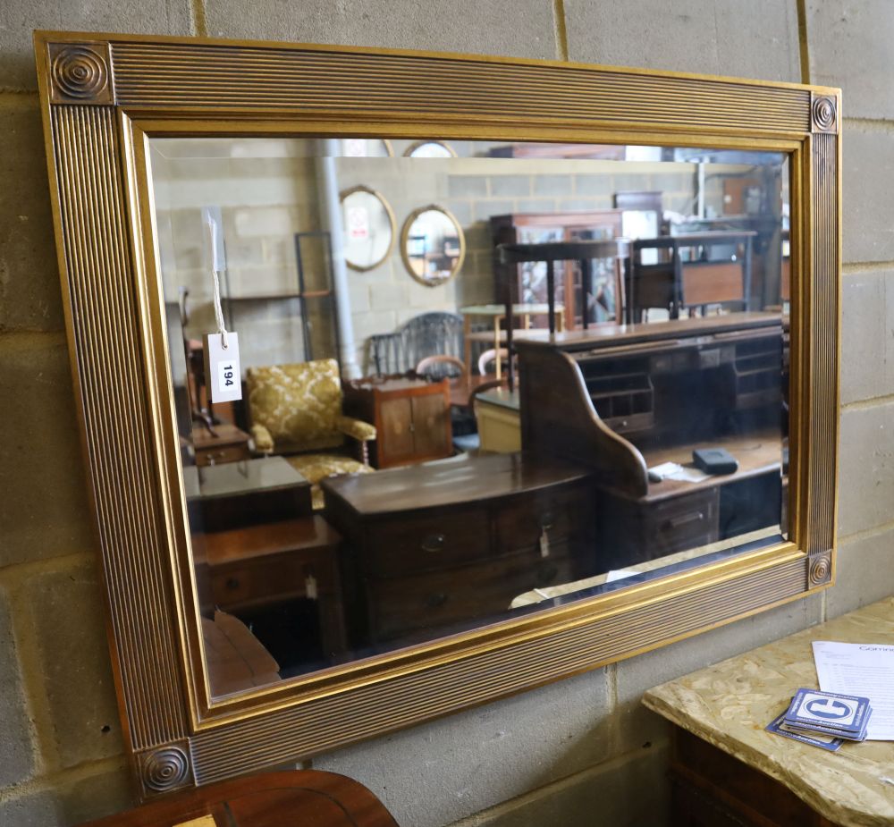 A rectangular gilt frame wall mirror, 110 x 79cm